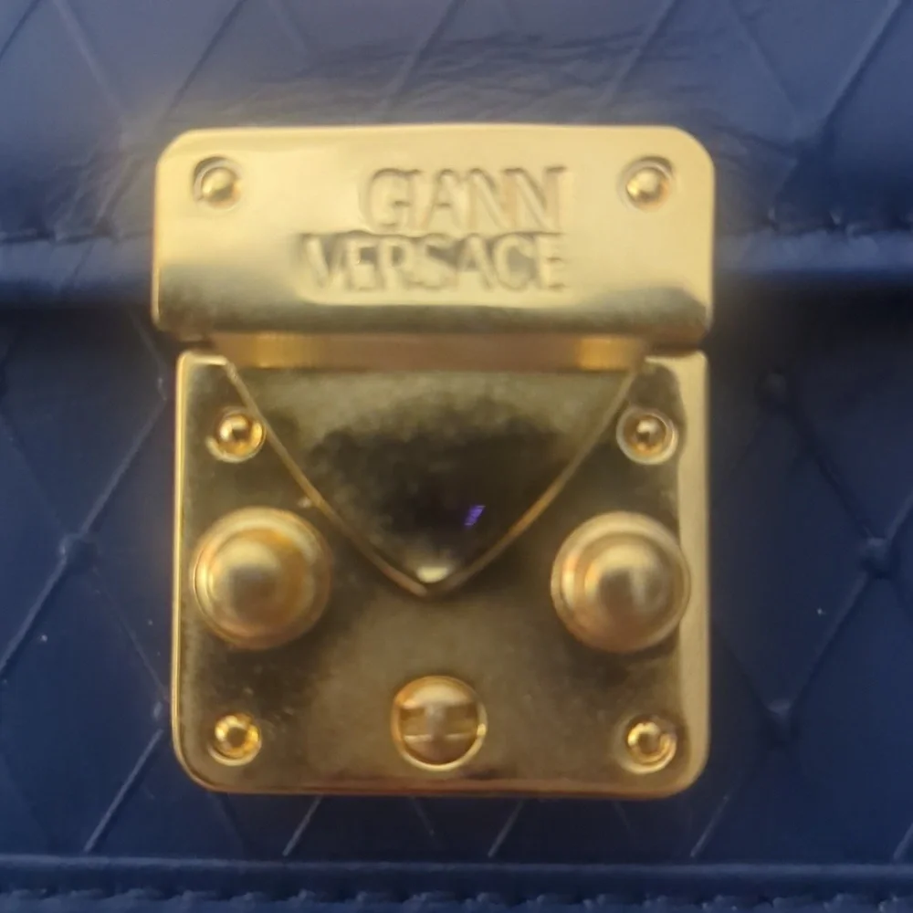 Versace Starburst Clutch Leather Gold Medusa .SALE PRICE.FINAL